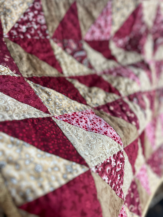 pink and brown triangle quilt